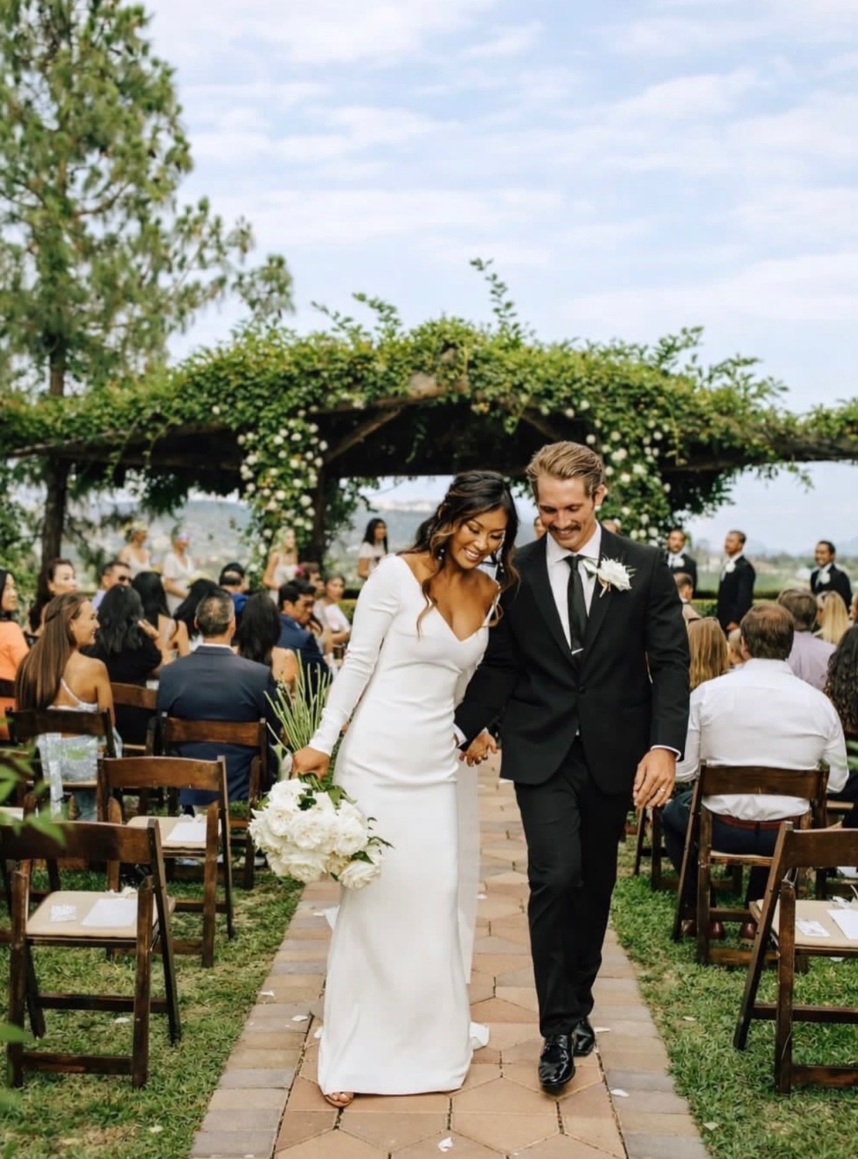 Wedding recessional happy couple ceremony Los Angeles bridal services